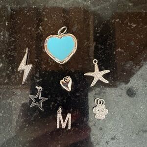 Multiple Silver Charms for sale!
